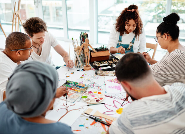 Creative people around a table