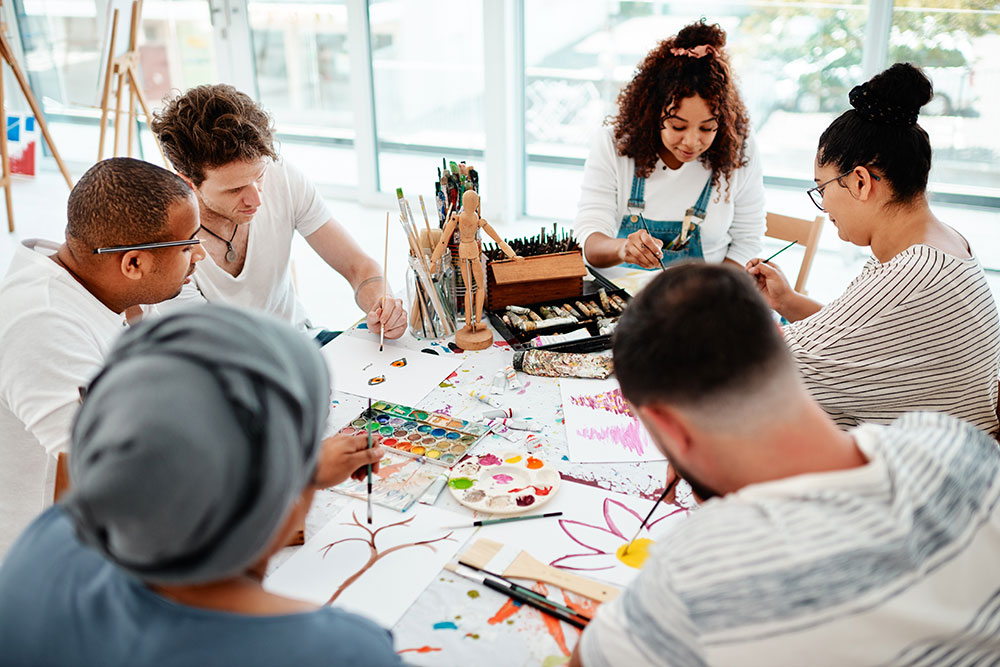 Creative people around a table